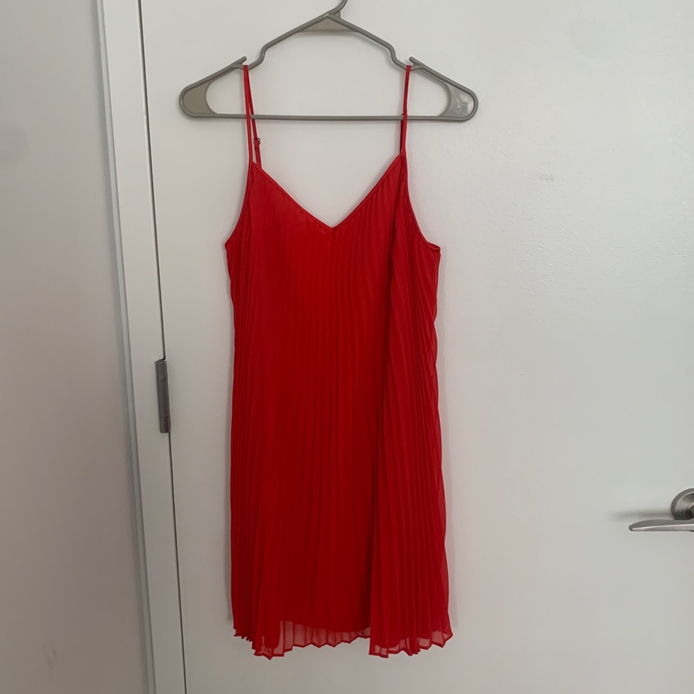 Red pleated dress